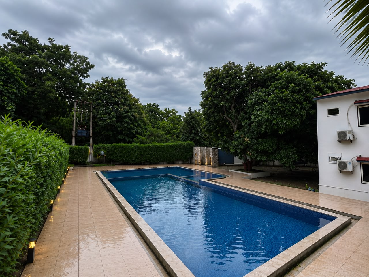 Outdoor swimming pool at Wildlife Gir Resort